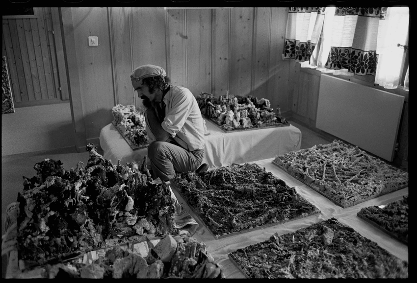 Marc Moret avec ses collages entreposés dans une pièce de sa ferme © Mario Del Curto, 1999